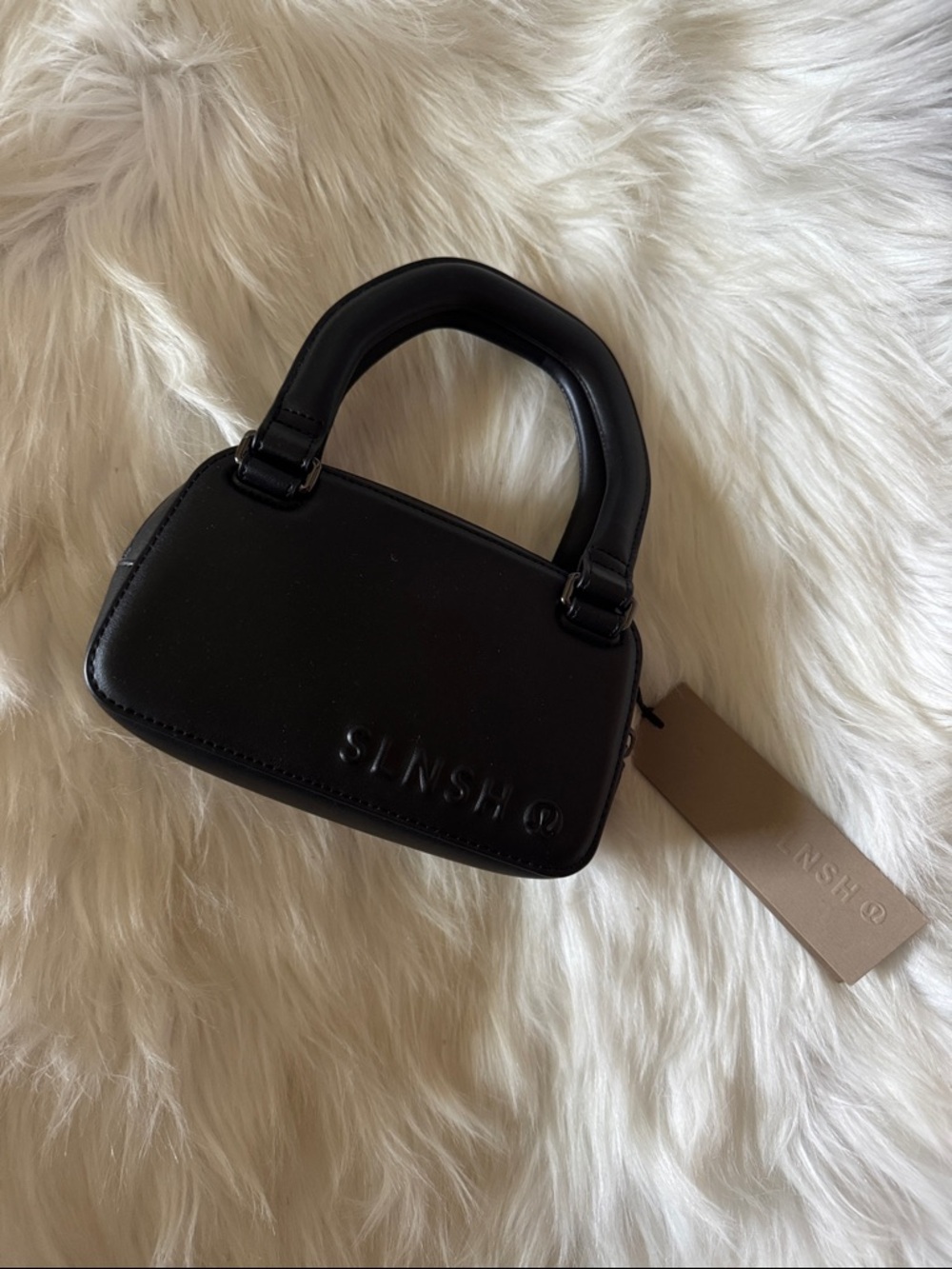 NWT Lululemon Leather Alternative Mini Belt Bag Saul Nash
Black / Silver